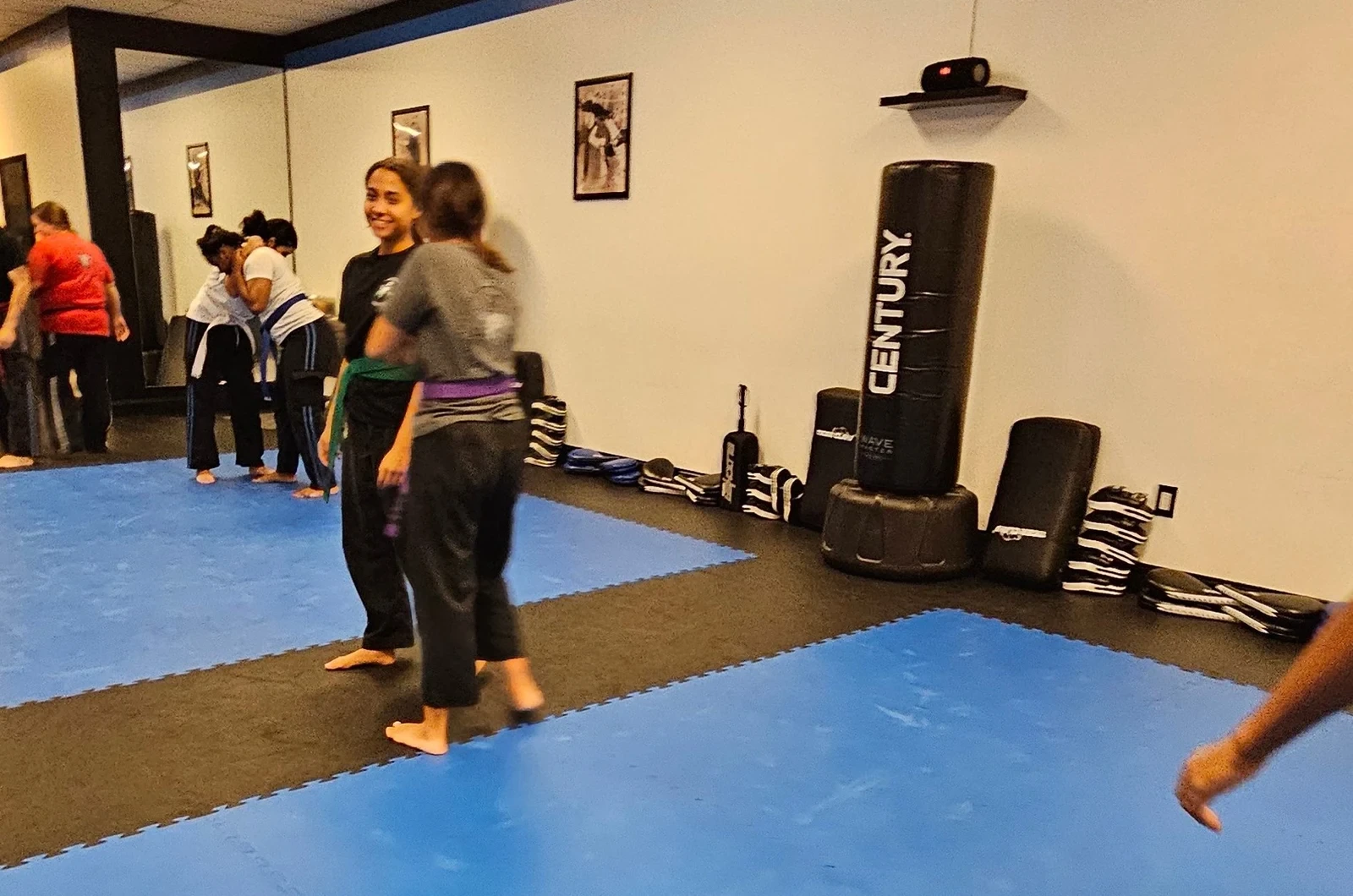 Adults relieving stress through martial arts